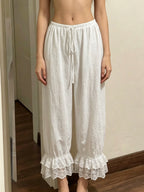 Ruffle-Hem Lace Trousers