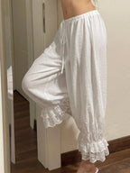 Ruffle-Hem Lace Trousers